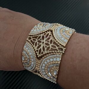 Francesca Collection, Gold Tone Open Work Design Stretch Bracelet 1 1/2” Wide